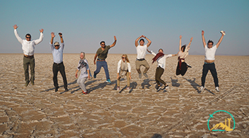 Excited Tourists in Iran Desert