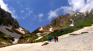 Climbers Ascending Alamkuh Mountain