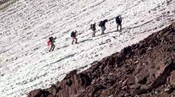 Climbers Climbing Lashgarak Peak to Alamkuh Mountain
