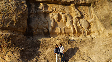 Tourists Posing in front of Bishapur Reliefs