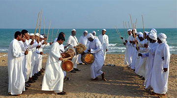 Bandari Men Dancing in Traditional Costume