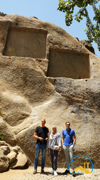 Tourists Taking Photo by Acaemenid Inscription in Hamedan