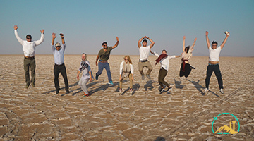 Excited Tourists in Iran Desert