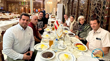 Tourists in Iranian Traditional Restaurant